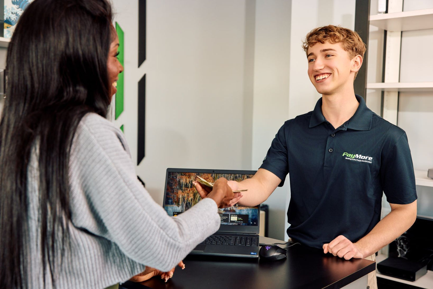 paymore employee paying a customer